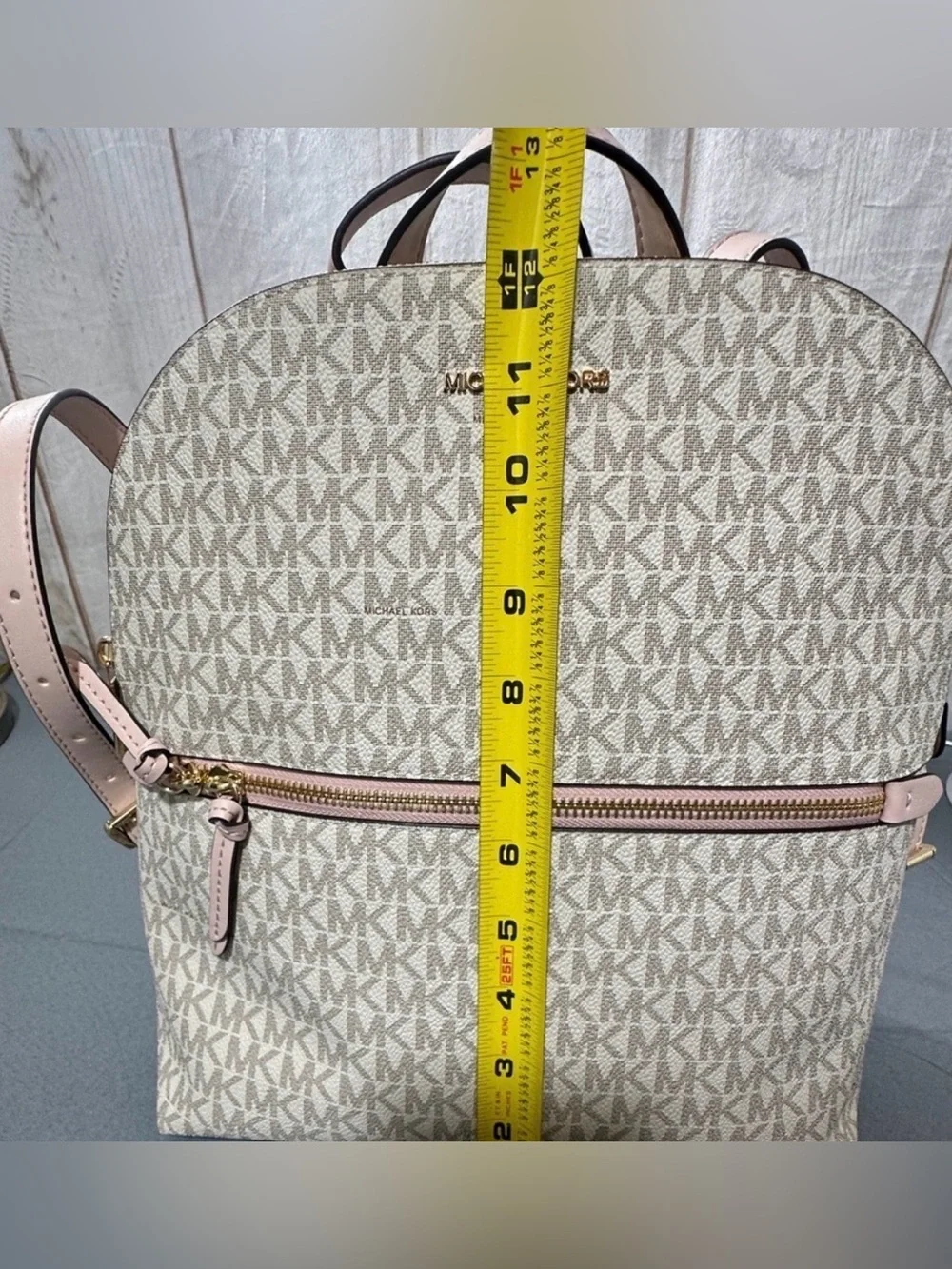 Michael Kors backpack logo